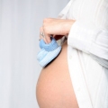 Pregnant tummy with boots
